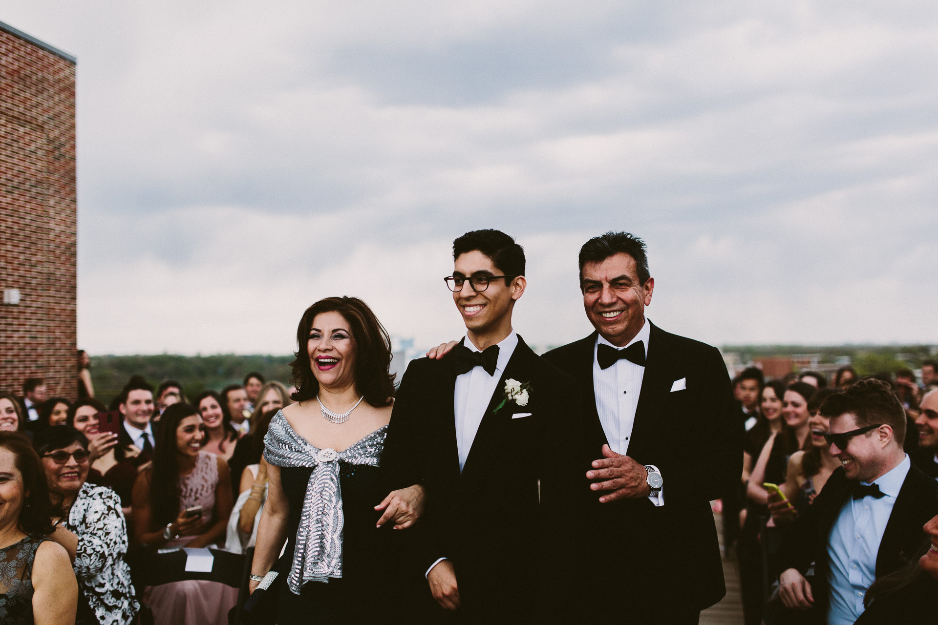 Picture of two men and women dressed in Black in the wedding