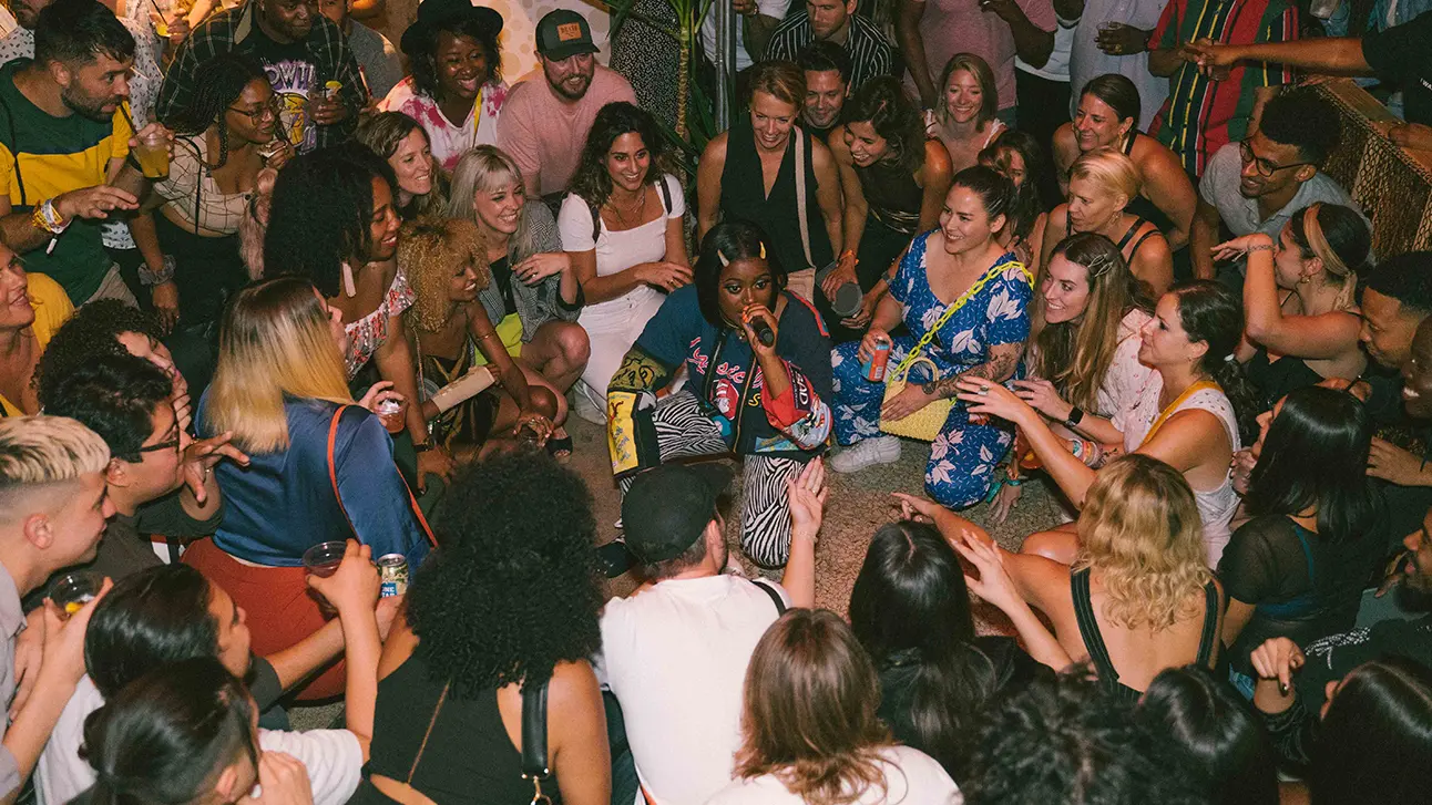 Girl is singing a song in front of audience
