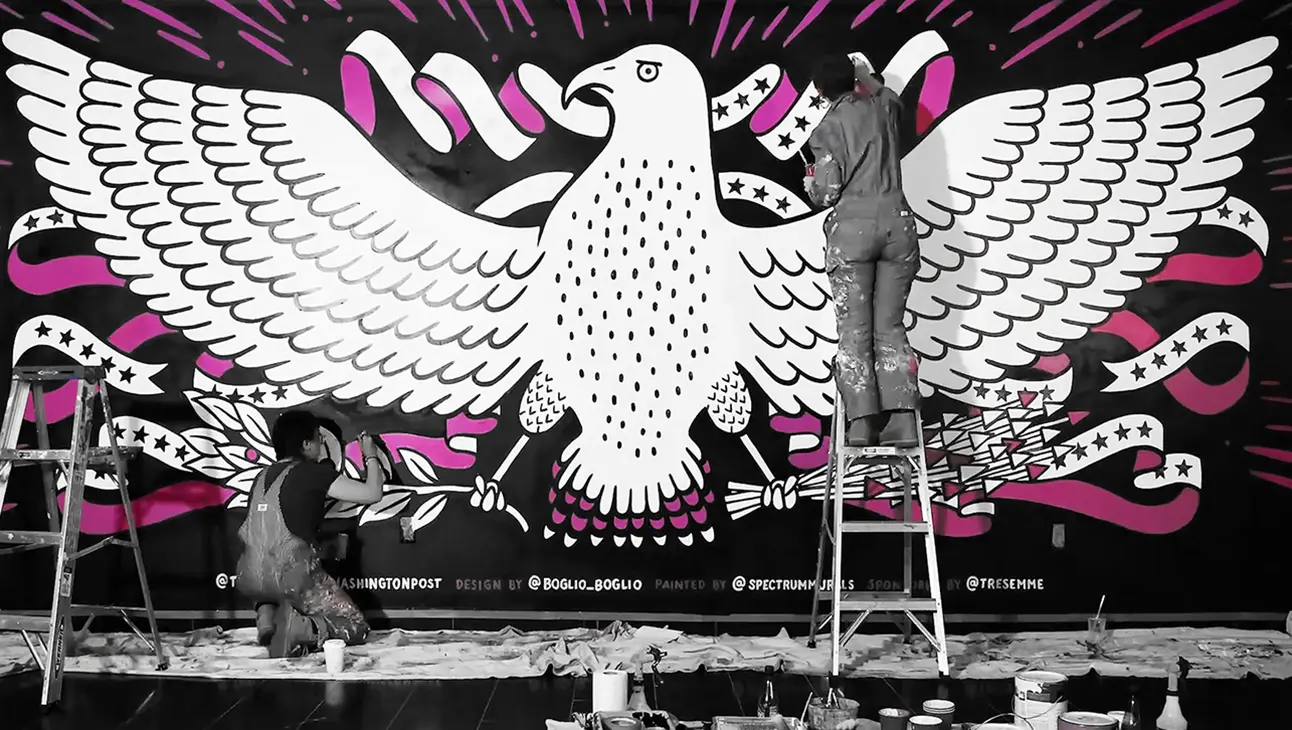 Poster is being painted according to the event