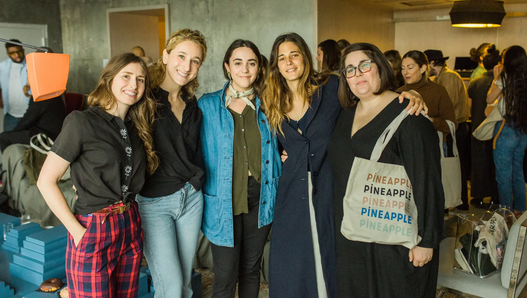 five Girls standing in a group posing in a event