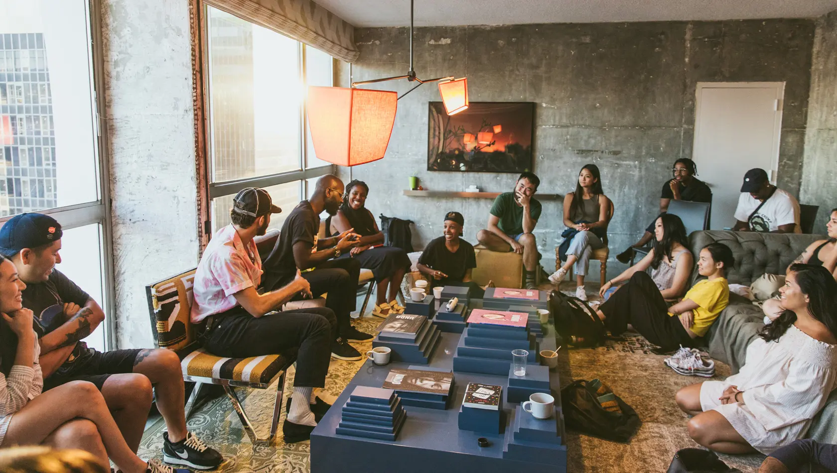 Group of People Sitting on Sofa While Discussing