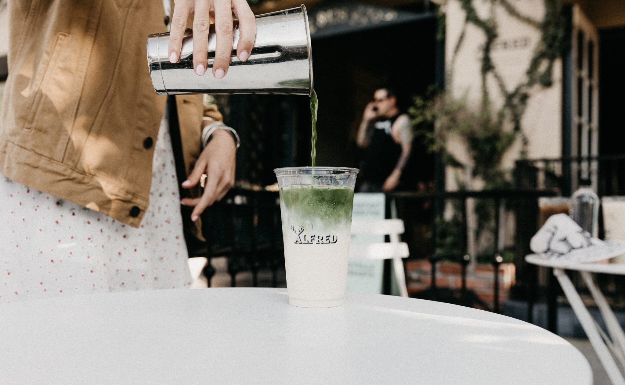 Iced Matcha Latte serving by the women