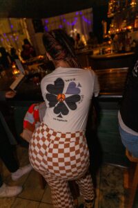 Girl wearing a t-shirt with a clover