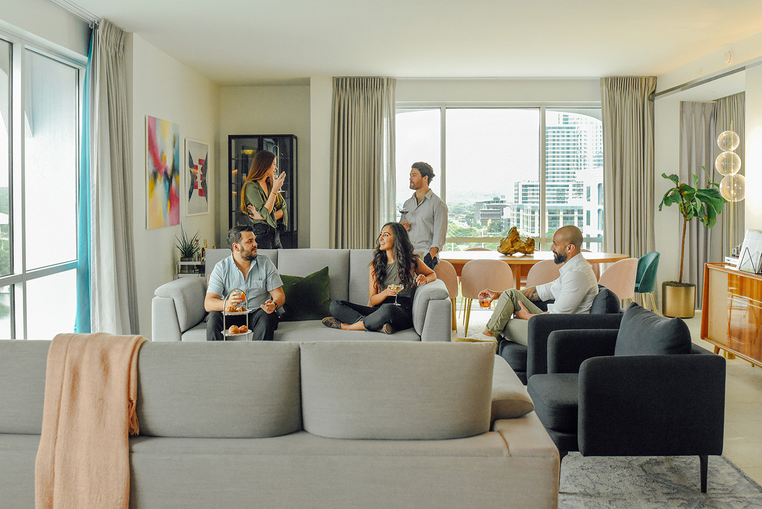 A group of people hanging out at the line austin rwb suite