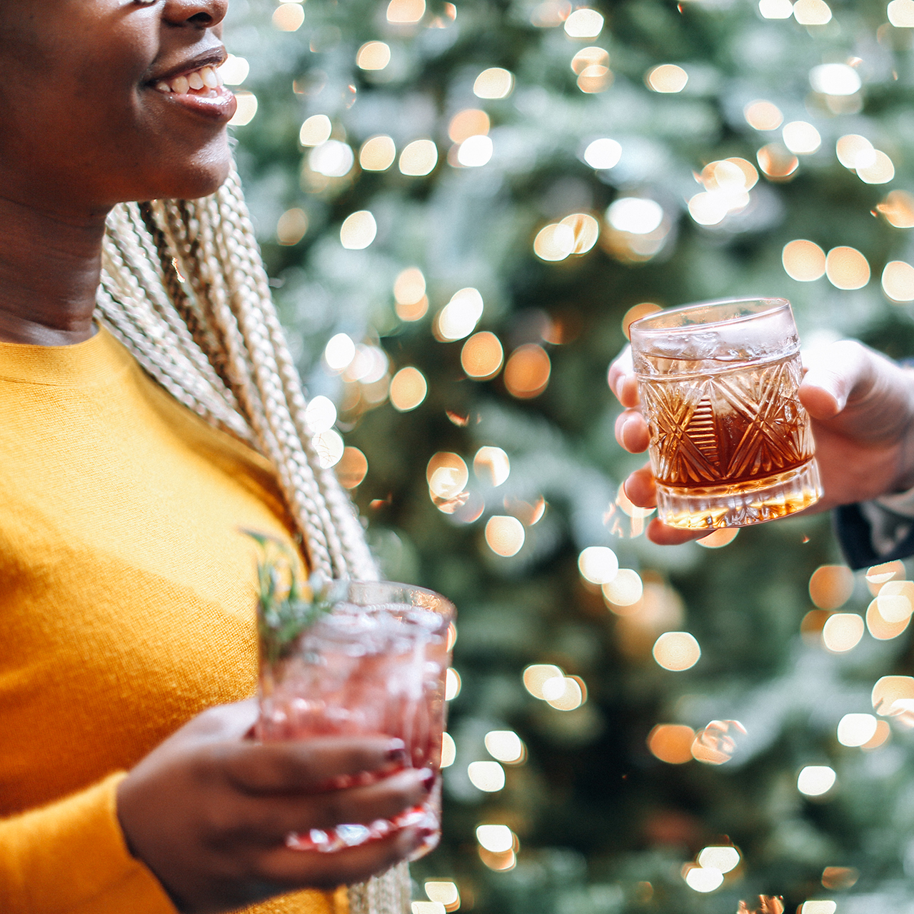 Two hands with drink