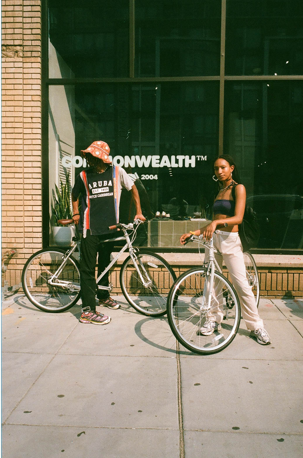 Man riding bike with a girl