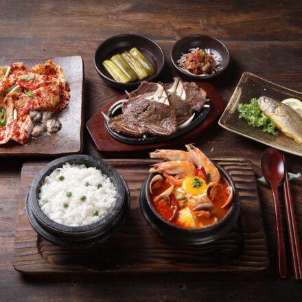 On the shaded table with some snacks food