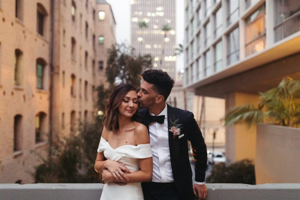 Married couple posing in the balcony
