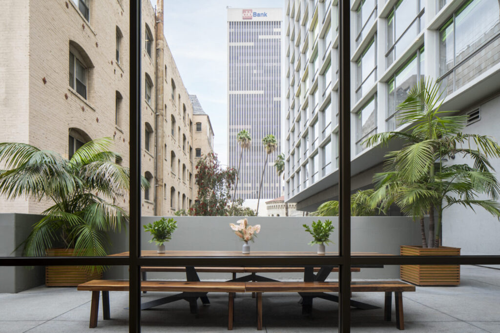 Table and chair in balcony with plants