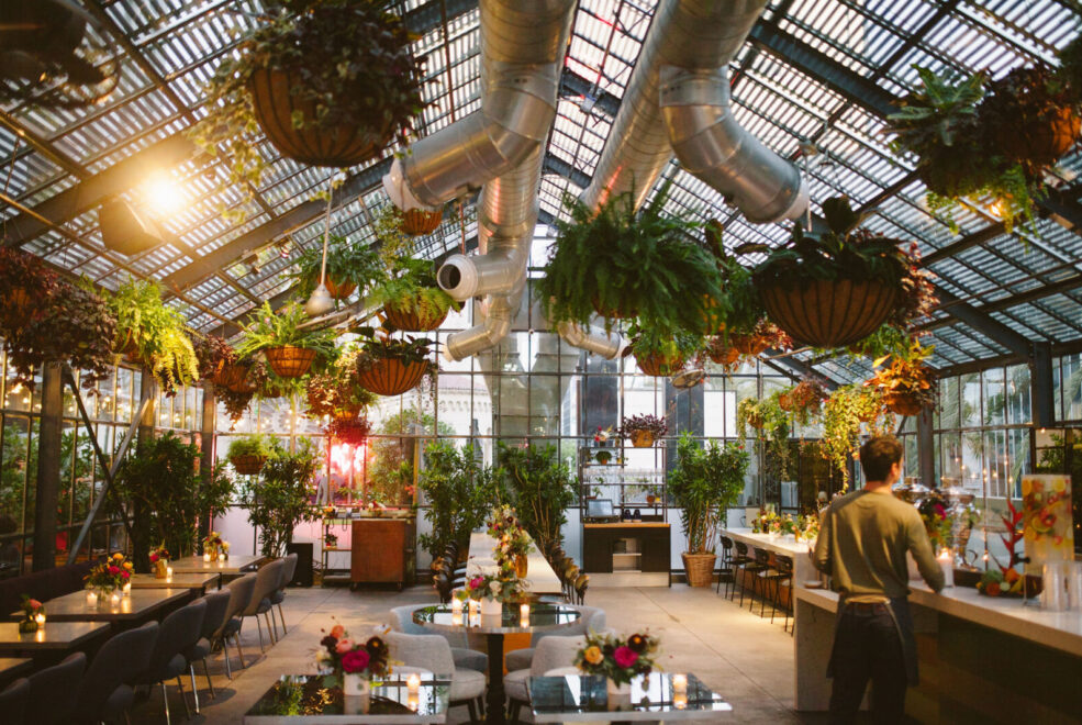 Dining table with glass and plate is set openaire wedding
