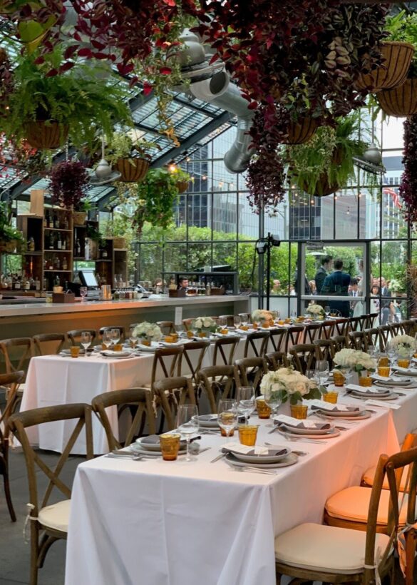Dining table with glass and plate is set openaire wedding