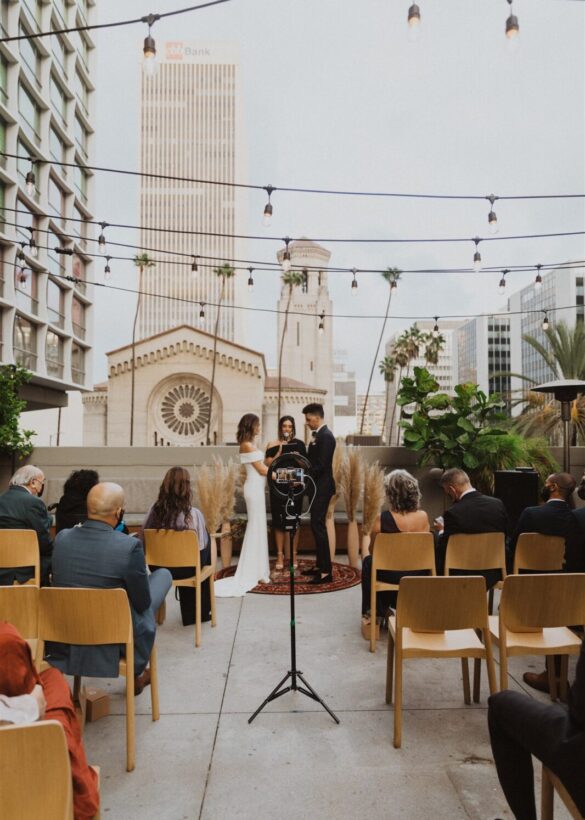 People sitting and watching the marriage