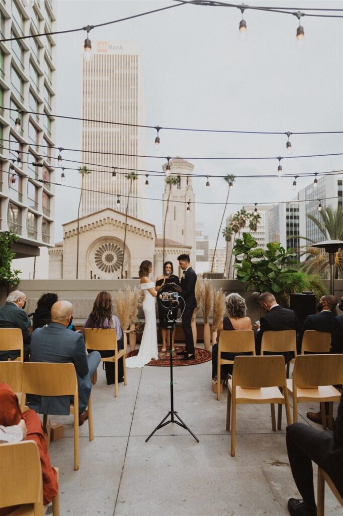 People sitting and watching the marriage