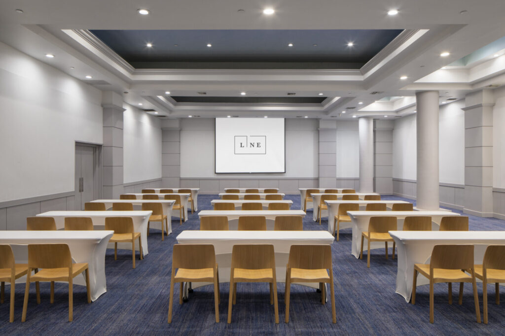 Ballroom with white table and yellow chair
