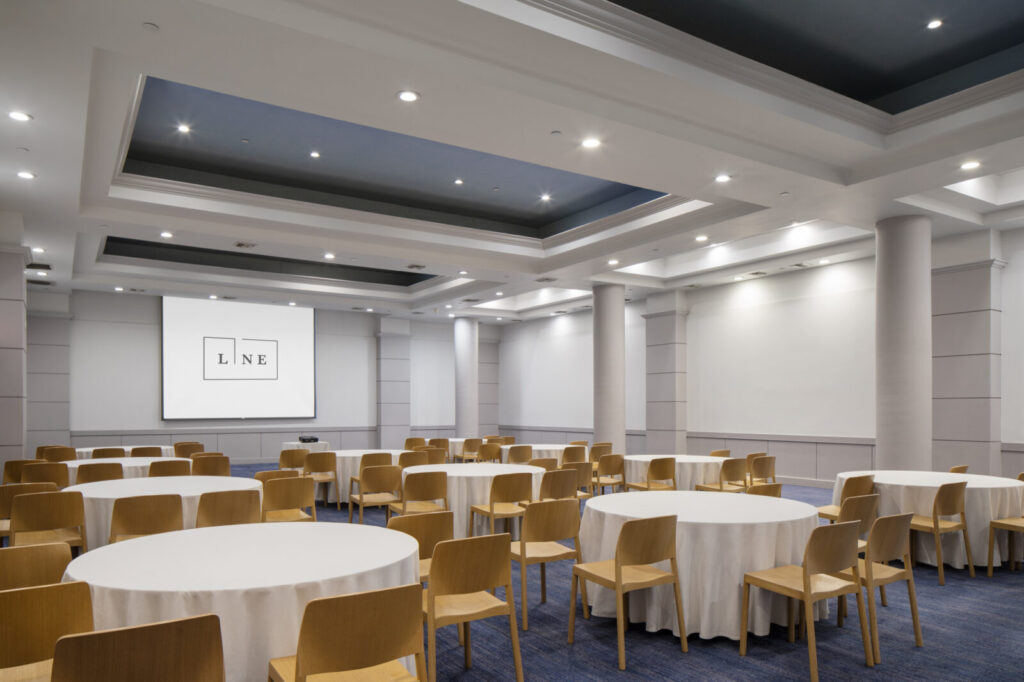 Ballroom with white table and yellow chair
