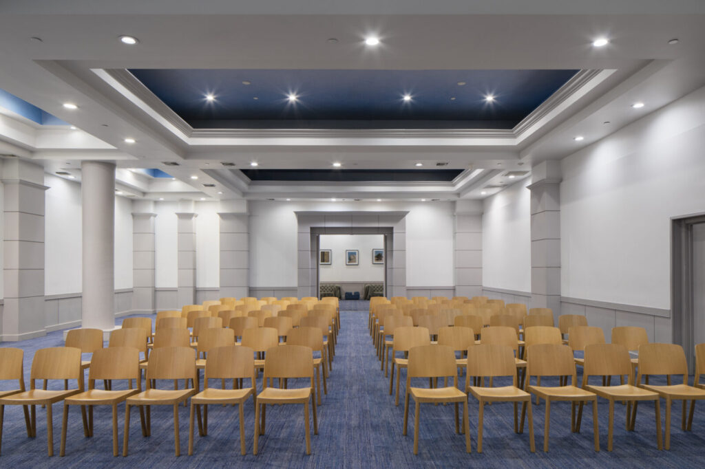 Ballroom theatre with yellow chairs