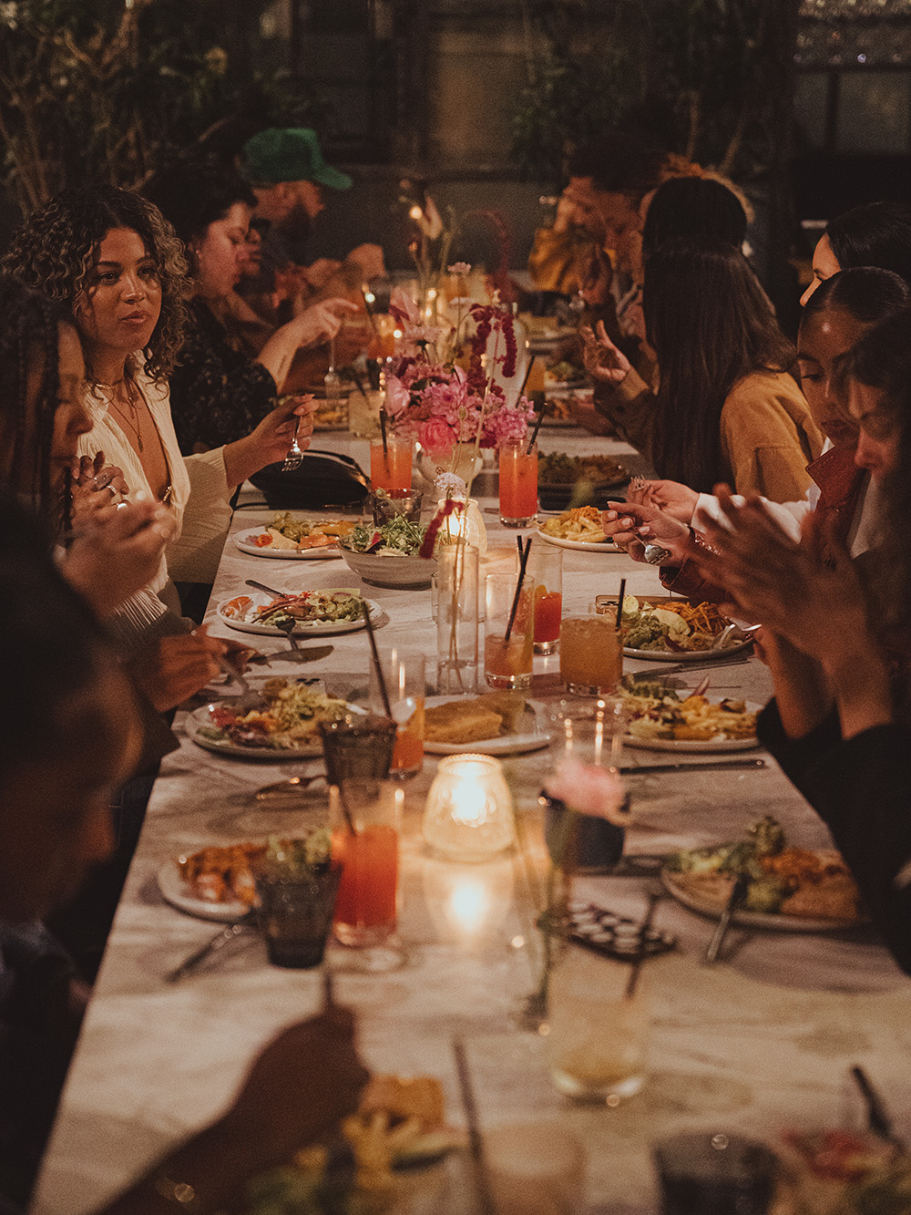 A group of people dining at a long table