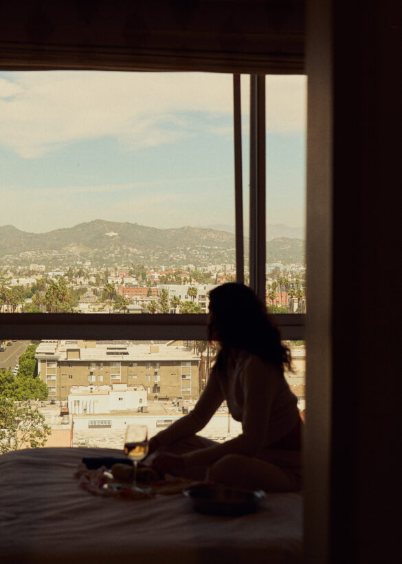 girl sitting by window