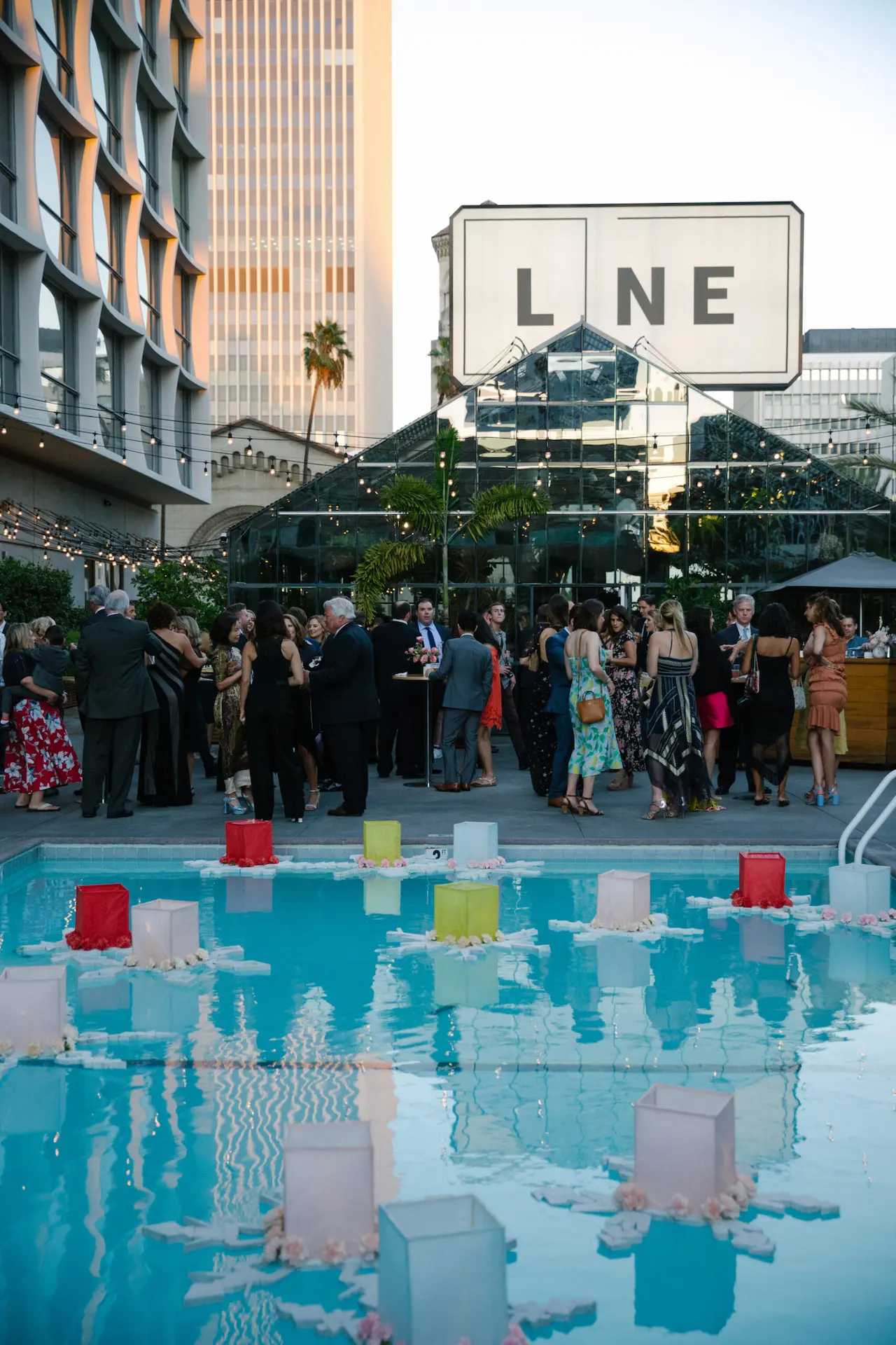 Pool & Openaire cocktail party with line logo.