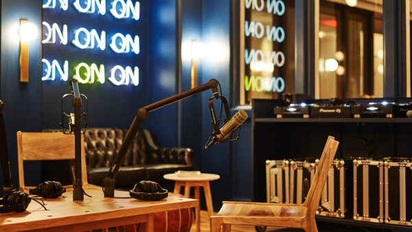 Picture of mike with empty chairs and black sofa