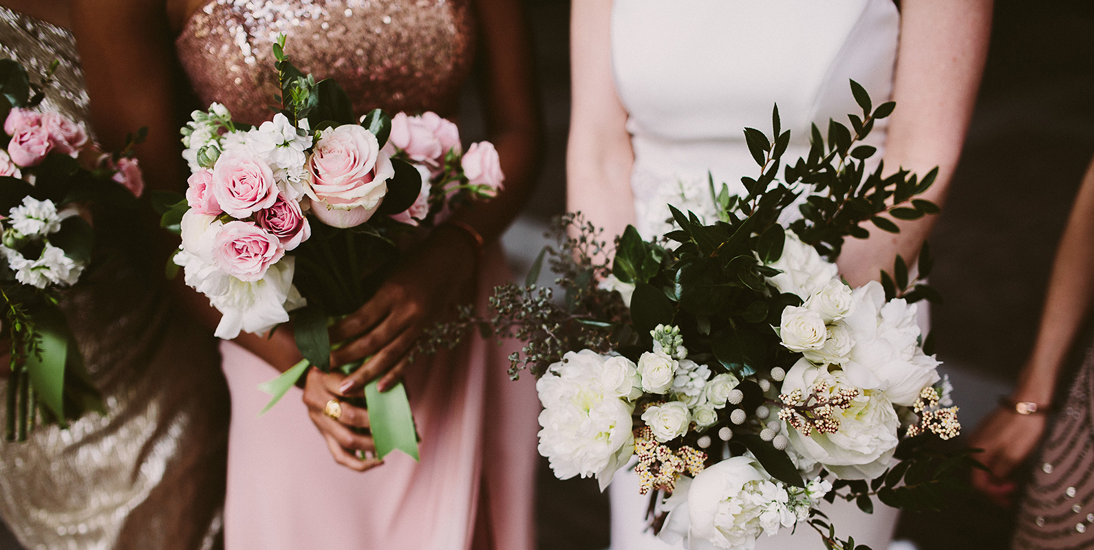 Two women holding flowers