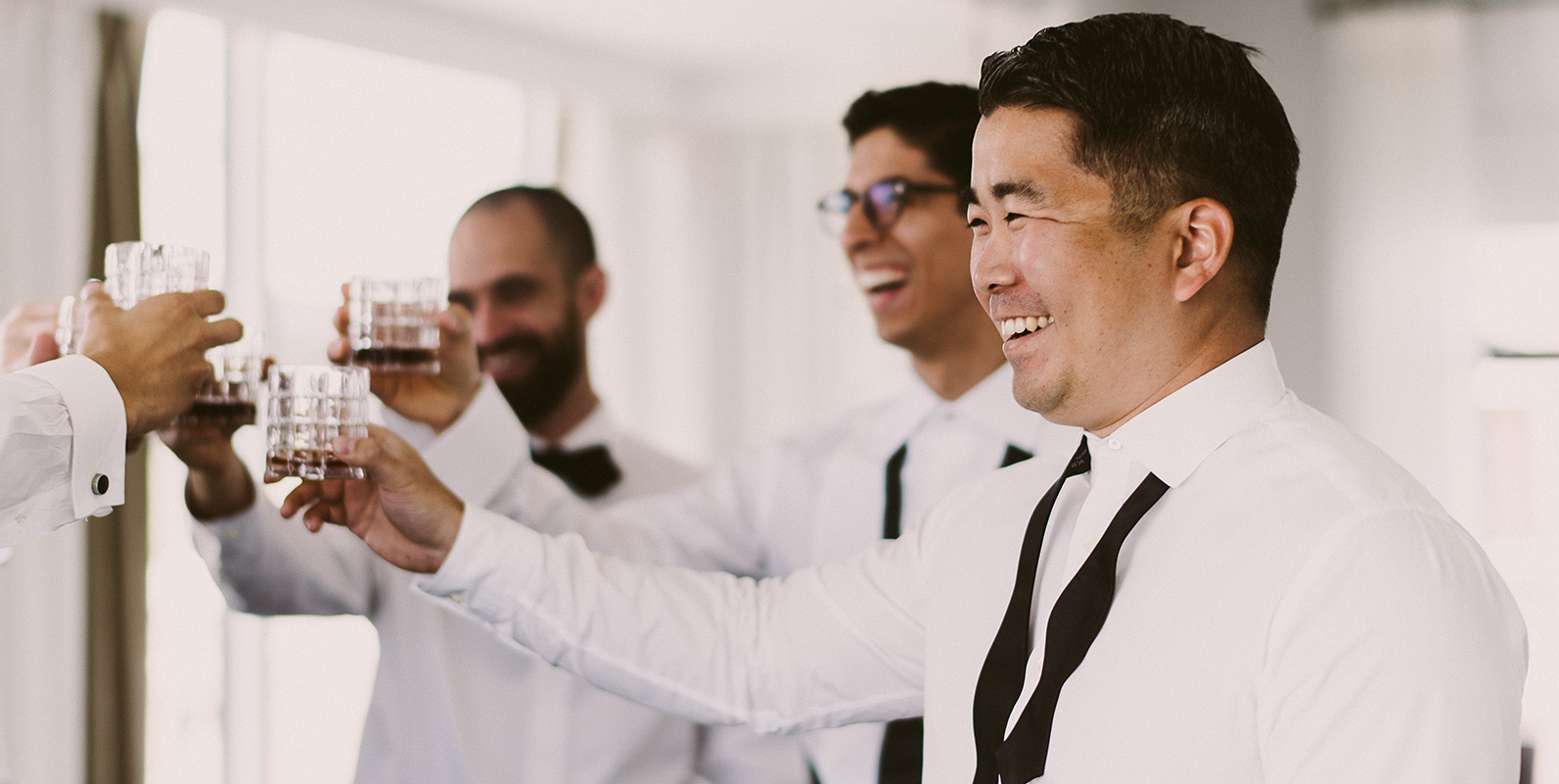 Men cheering up drink