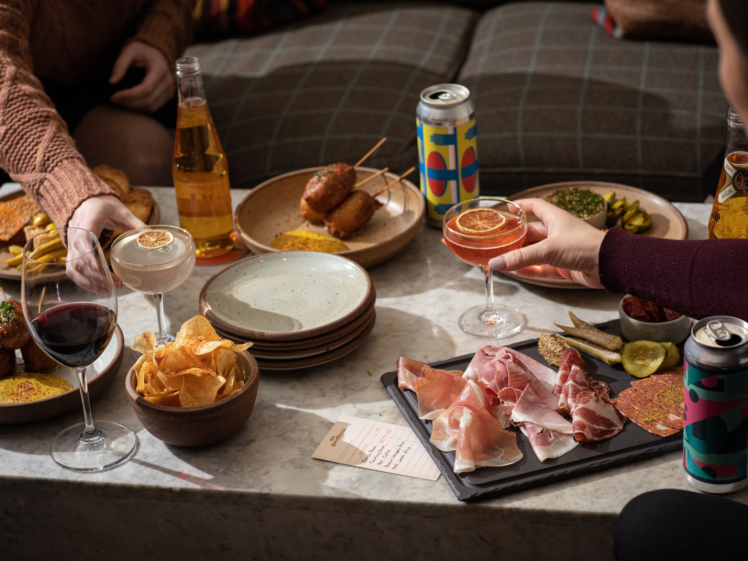 the food and the champagne bottle on the table