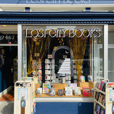 Picture of lost city books with yellow hanging decor