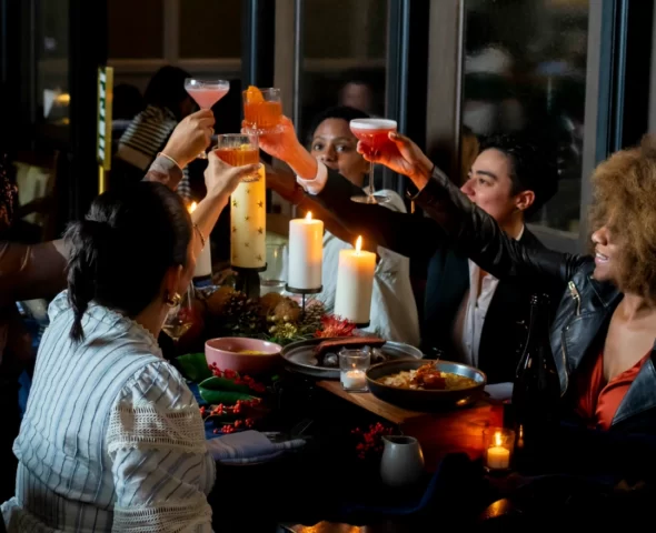 people raising a toast