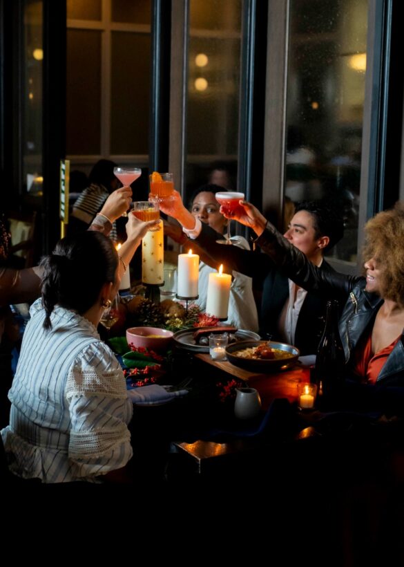 people toasting with drinks