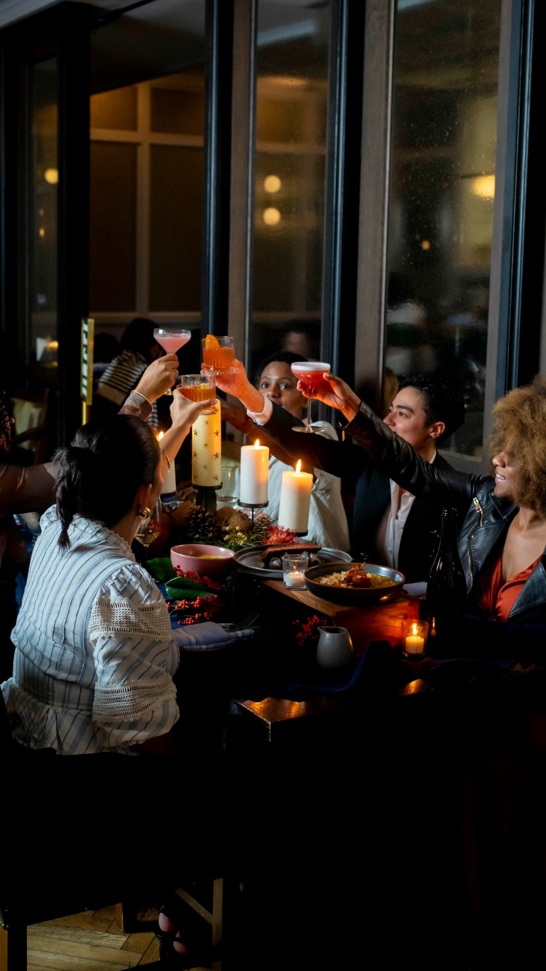 people toasting with drinks
