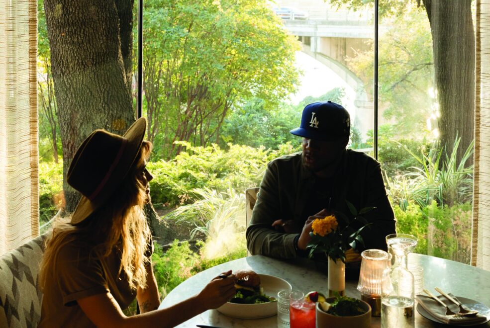 Picture of a woman with a man on the dining table