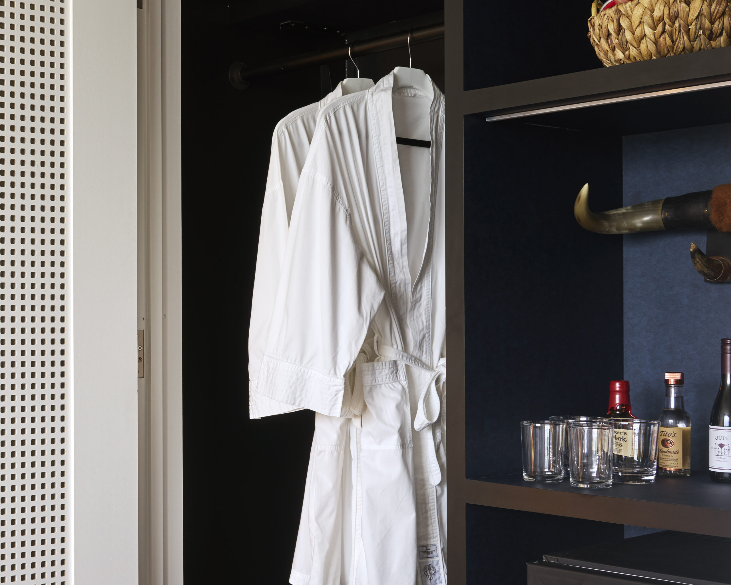 Closet with the bottle and glass