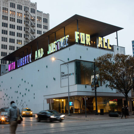 White building with text written on it