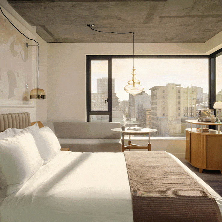 A hotel room with shadows on the bed and the view of a cityscape, plus other moody images.